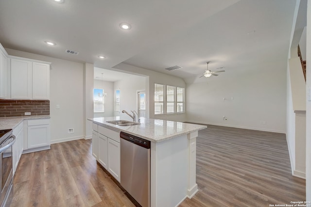 kitchen with light wood-type flooring, white cabinetry, sink, and stainless steel appliances