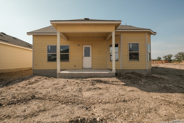 rear view of property with a patio area