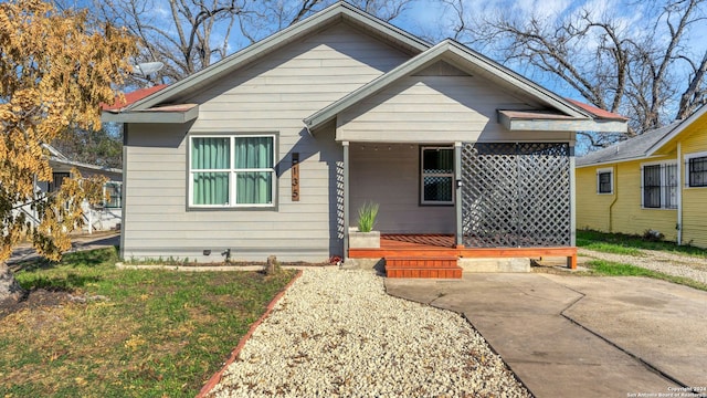 bungalow-style home featuring a porch