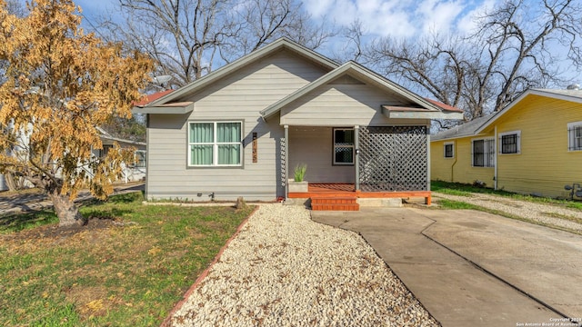 bungalow-style house featuring covered porch