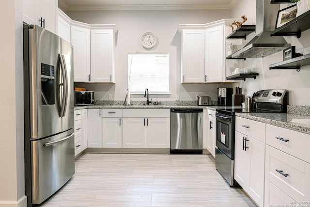 117 Fairview Ave, San Antonio, TX 78223 - kitchen featuring stainless steel appliances, open shelves, light stone countertops, white cabinetry, and crown molding