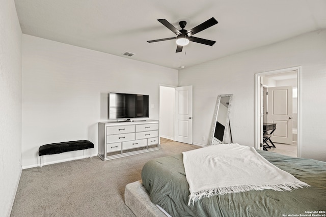 bedroom with ceiling fan and light colored carpet