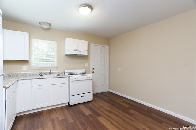 kitchen with white cabinets, sink, dark hardwood / wood-style floors, and white gas stove