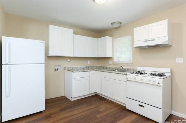 kitchen featuring white appliances, dark hardwood / wood-style flooring, range hood, sink, and white cabinetry