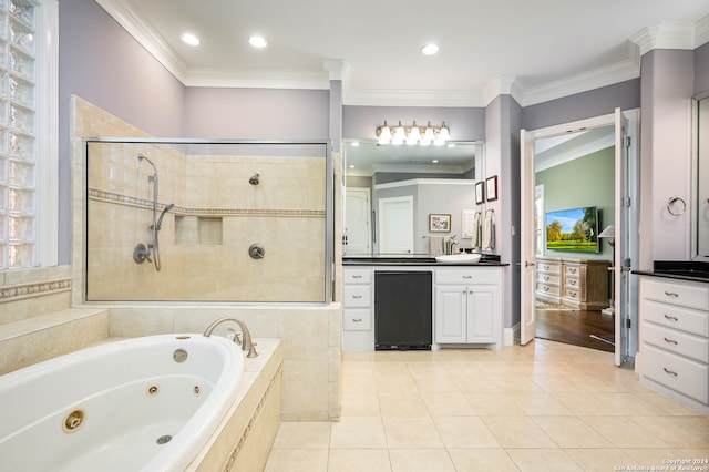 bathroom featuring ornamental molding, tile patterned flooring, separate shower and tub, and vanity