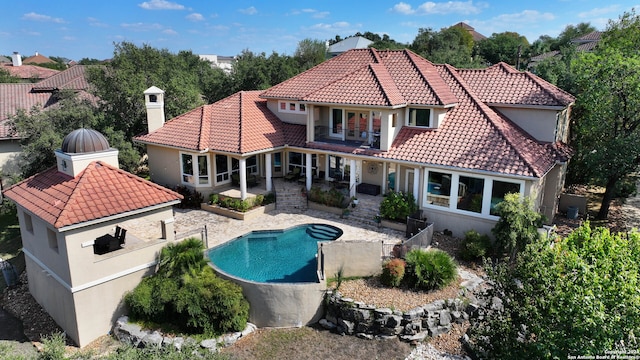 back of house featuring a patio