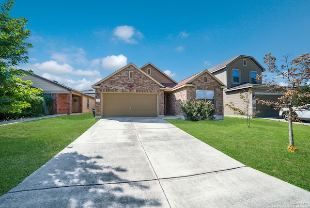 view of front of house featuring a garage and a front lawn