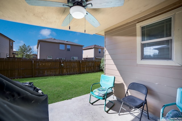 view of patio with ceiling fan