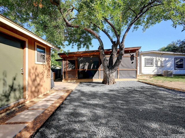 exterior space featuring a patio and central AC