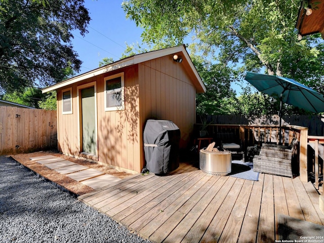 view of outbuilding with an outdoor hangout area