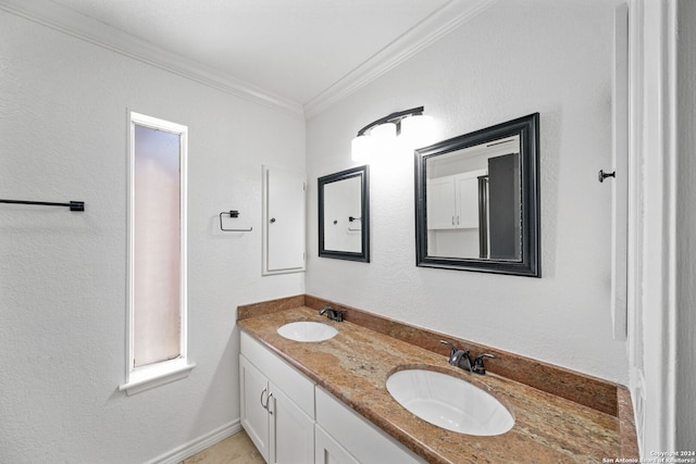 bathroom with vanity and ornamental molding