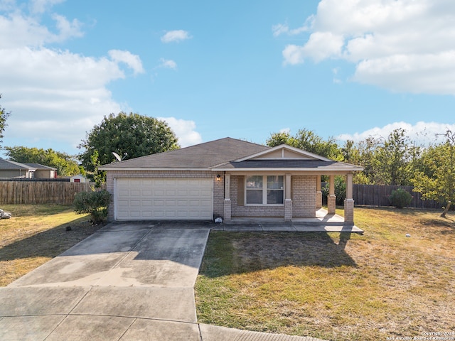 single story home with a garage and a front yard