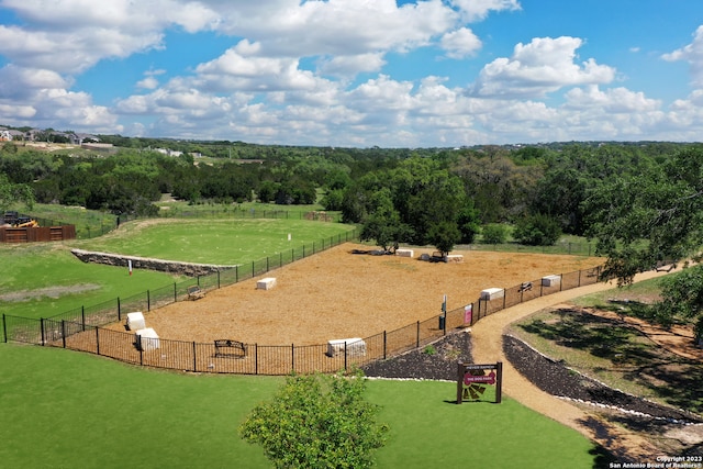 birds eye view of property featuring a rural view