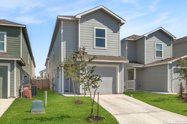 front facade featuring a garage and a front yard