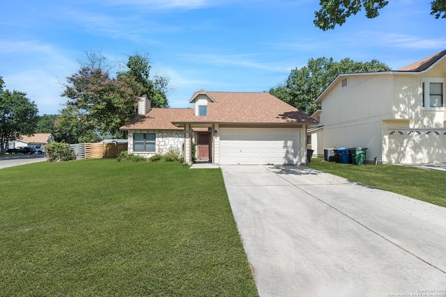 front of property with a garage and a front yard