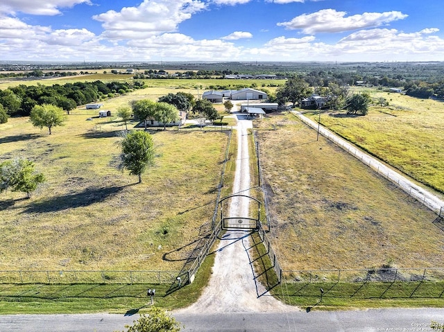 6776 Green Valley Rd, Cibolo, TX 78108 - rear view of house with stone siding, a patio area, a chimney, and fence