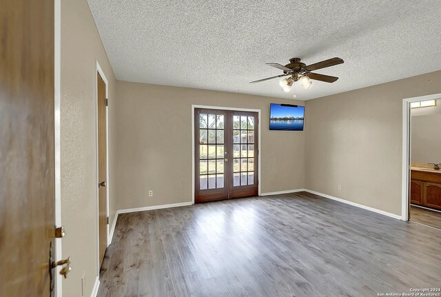 6776 Green Valley Rd, Cibolo, TX 78108 - full bath featuring a sink, a textured ceiling, and double vanity