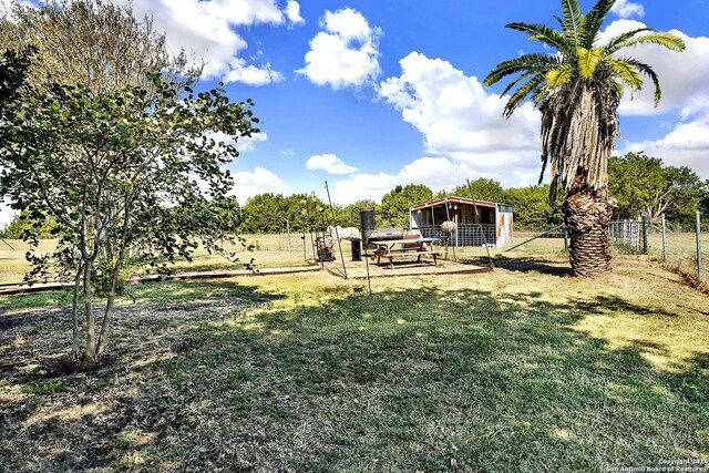 6776 Green Valley Rd, Cibolo, TX 78108 - back of house featuring stone siding, french doors, and a deck