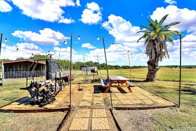 view of playground with a rural view