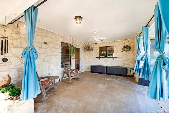 view of patio / terrace featuring ceiling fan