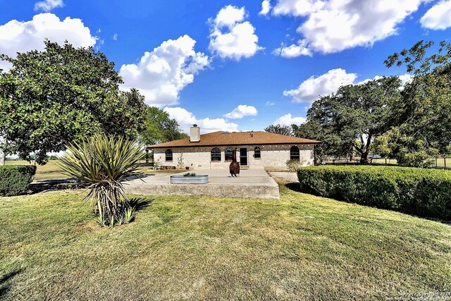 6776 Green Valley Rd, Cibolo, TX 78108 - rear view of house with fence and a yard