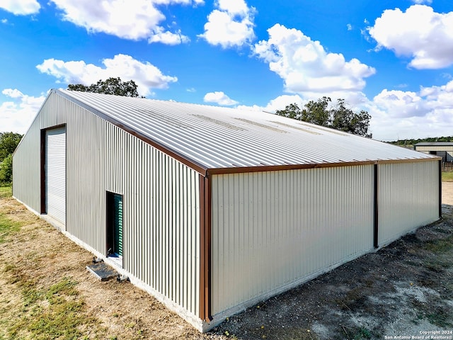 view of outdoor structure featuring a garage