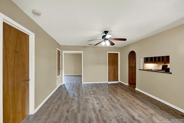 6776 Green Valley Rd, Cibolo, TX 78108 - unfurnished bedroom with recessed lighting, wood finished floors, a textured ceiling, and a closet