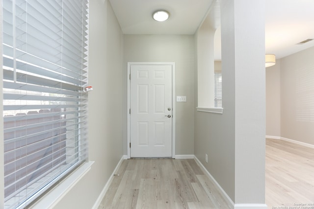 doorway featuring light hardwood / wood-style floors