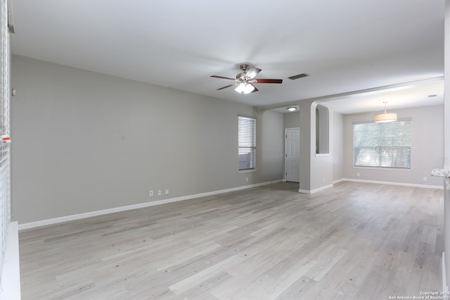 unfurnished room with light hardwood / wood-style floors and ceiling fan