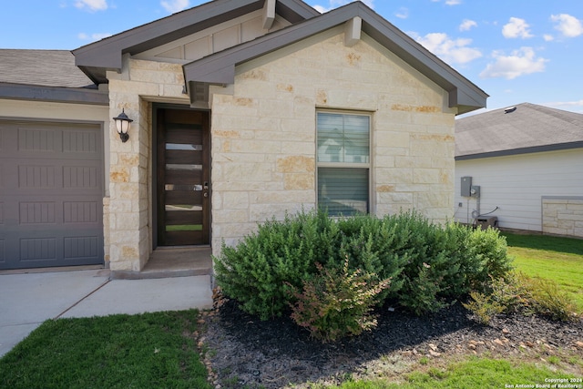 entrance to property with a garage