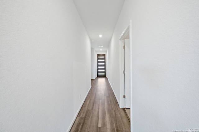 hallway featuring hardwood / wood-style floors