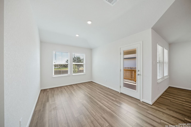 spare room with light wood-type flooring