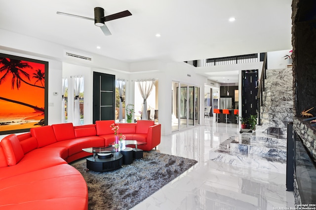 living room with ceiling fan