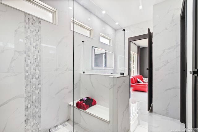 bathroom featuring tiled shower