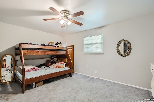 bedroom featuring ceiling fan and light colored carpet