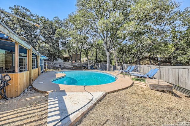 view of pool featuring a patio area