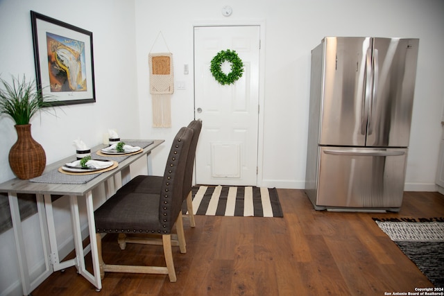 interior space with dark hardwood / wood-style flooring