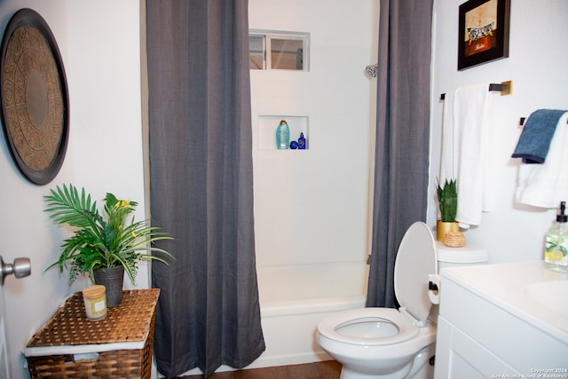 full bathroom with vanity, toilet, and shower / bathtub combination with curtain