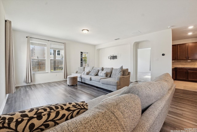 living room featuring dark hardwood / wood-style floors