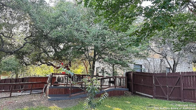 view of yard featuring a deck