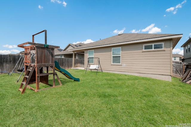 view of play area featuring a yard