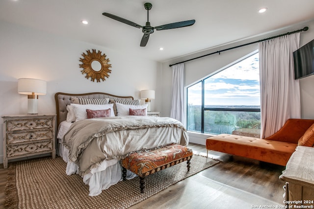 bedroom featuring dark wood-type flooring and ceiling fan