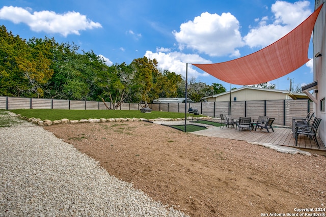 surrounding community featuring a wooden deck