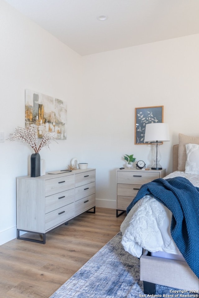 bedroom featuring light hardwood / wood-style flooring