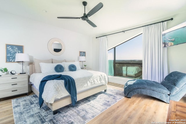 bedroom featuring hardwood / wood-style flooring and ceiling fan