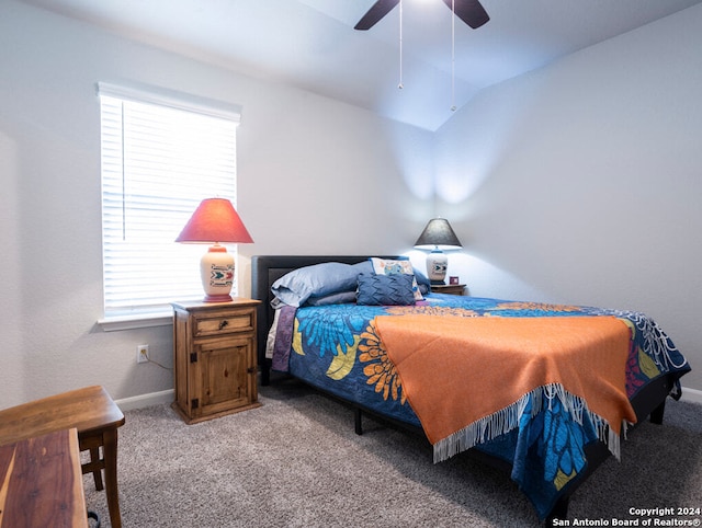 carpeted bedroom with ceiling fan and lofted ceiling