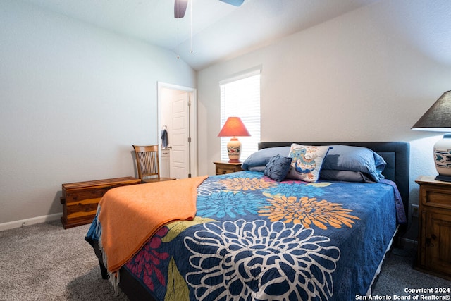 carpeted bedroom featuring vaulted ceiling and ceiling fan