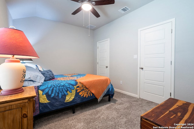 bedroom with lofted ceiling, light colored carpet, and ceiling fan