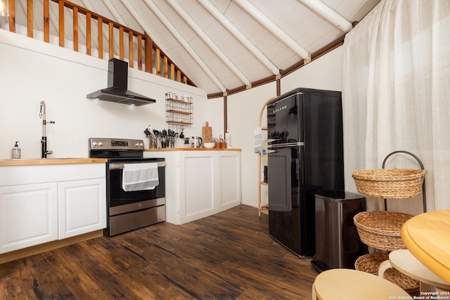 kitchen featuring wall chimney range hood, beamed ceiling, stainless steel range with electric cooktop, dark hardwood / wood-style flooring, and black fridge