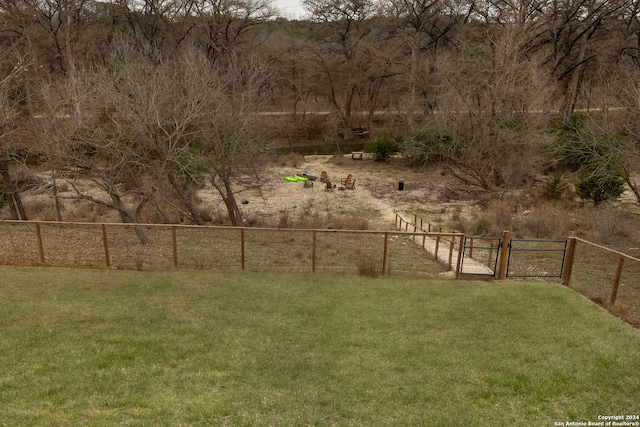 view of yard with a rural view